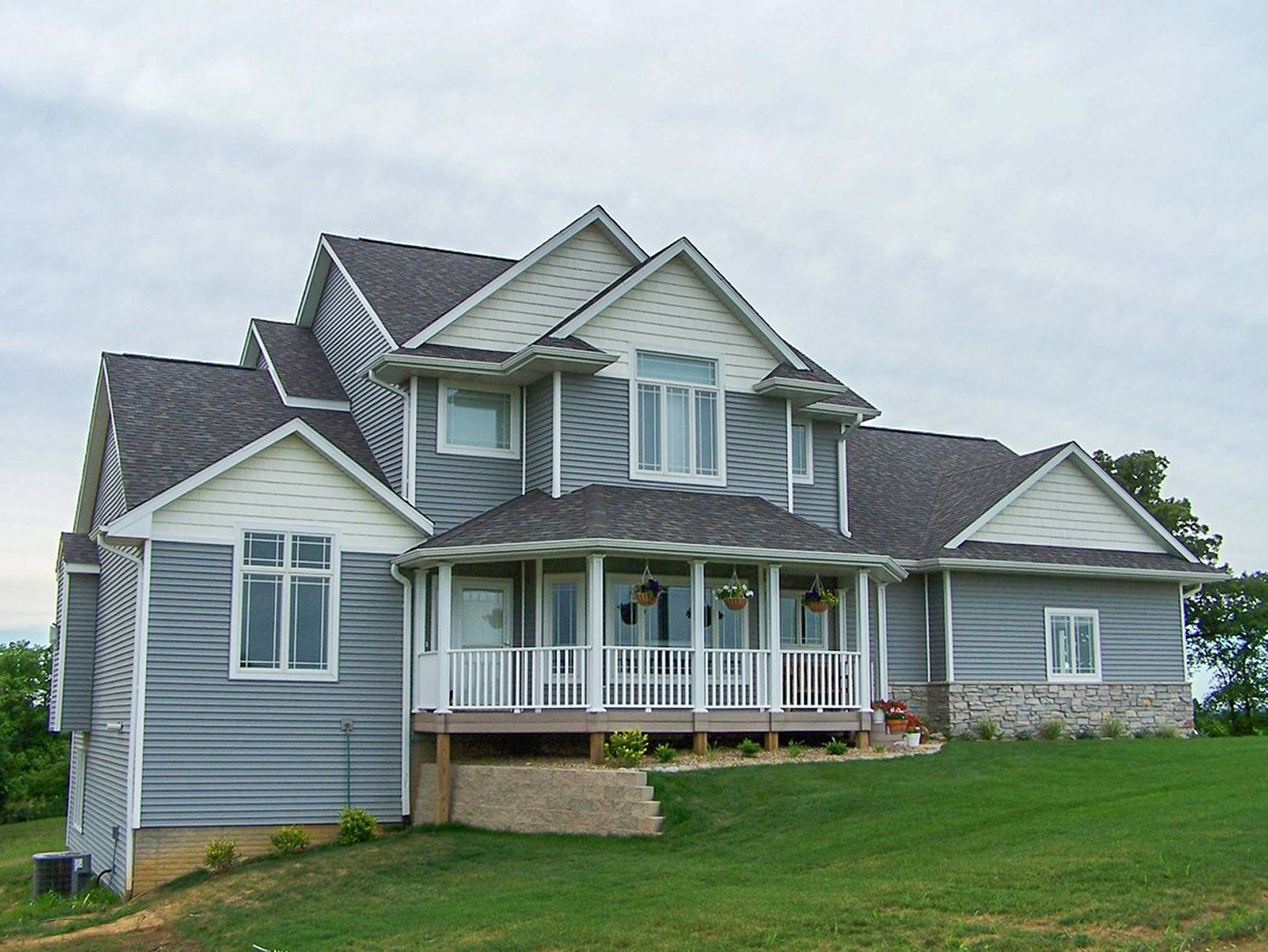 SGA Construction new home exterior view with porch and paneling